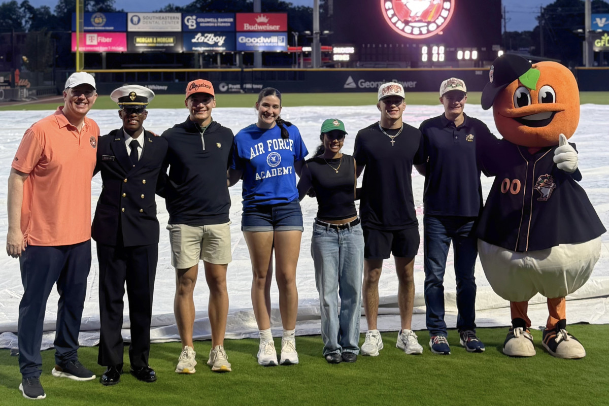 Congressman Brian Jack joins students that he appointed to military service academies.