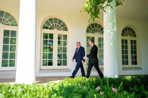 President Trump and Rep. Jack walk in the Rose Garden